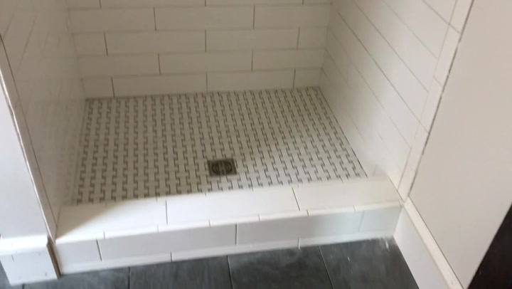 The Beach House Bathrooms Are Tiled, How To Tile A Shower Curb With Subway