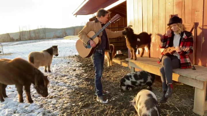 Kyra Sedgwick and Kevin Bacon sing on their farm