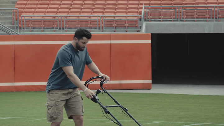 Image result for baker mayfield mowing lawn